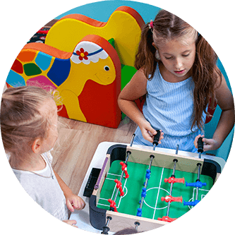 Children playing table football